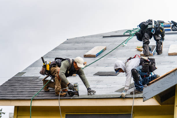 Professional Gutter Installation technician working in Henryville, PA